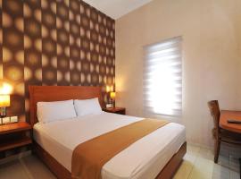 阿马亚套房酒店，位于日惹Mlati的酒店