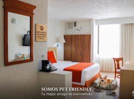 瑞欧德拉果套房酒店，位于比亚埃尔莫萨卡洛斯&middot;罗维罗萨&middot;佩雷斯机场附近的酒店