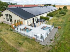 奥罗姆斯尼加德农场酒店，位于Löderup的酒店