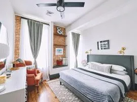 Luxe Main St Loft with Rooftop Lounge and Balcony