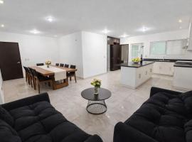 Casa amplia 3 recamaras con asador ideal para grupos，位于圣胡安德里奥的酒店