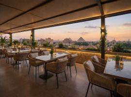 Royal marvel Pyramids Hotel，位于开罗的酒店