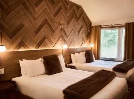 Motel Boutique Hygge - anciennement Aux Portes du Soleil，位于拜圣保罗的酒店