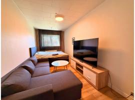 Cozy Room in the heart of Rødby! 5km from Femern & Puttgarden!，位于勒兹比的酒店