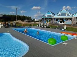 Two-story holiday homes, summer pool, sauna