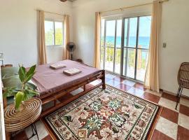 Balay Paraiso Beachhouse and Cottages，位于Daanbantayan的酒店