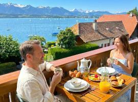 Lake Thun Alps Scenic Views and Concierge by SwissHut，位于图恩的酒店