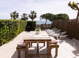 Baconer - Casa en l'Ampolla con jard&iacute;n privado y acceso directo al mar - Deltavacaciones，位于安波拉的酒店
