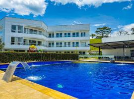 Hotel Palmeras De Luz，位于莫尼基拉的酒店
