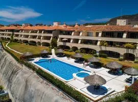 Oceanfront condo with pool, balcony, amazing views, washer/dryer, & partial AC