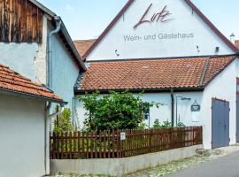 Wein- und Gästehaus Lutz，位于伊普霍芬的酒店