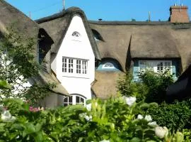 Gemütliche Wohnung Reet-Pool-Sauna