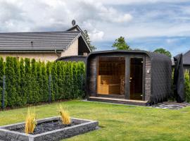 Ferienhaus am See mit Sauna，位于Barßel的酒店