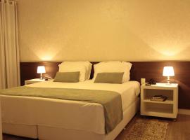 Hz Hotel，位于帕图斯迪米纳斯的酒店