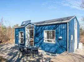 4 person holiday home in Grenaa