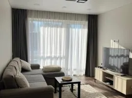 Modern apartment with Private parking - 10 min to airport, 15 min Center