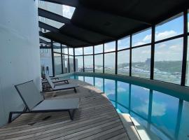 Condominio MOTTO Departamento 1 habitación con Alberca y Gimnasio 24 horas，位于Hércules的酒店