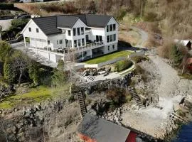 Beachfront Villa with Jacuzzi, Cinema & Canoe