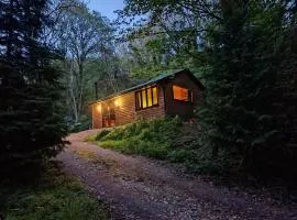 Stream-side cabin and sauna