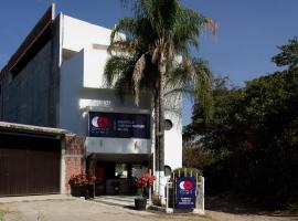 Capital O Hotel Partidor Del Sol，位于瓦兹特佩克的酒店