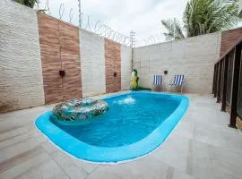 Casa em Jacumã com Piscina, 5 Suítes e Fliperama