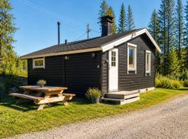 Koselig Hytte i Hemsedal with outdoor Sauna，位于海姆瑟达尔的酒店