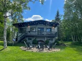 Lakefront Chalet des Sables with Private Beach & Game Room