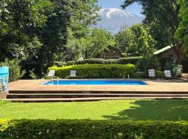 Kilimanjaro Lodge - MCF，位于莫希的酒店