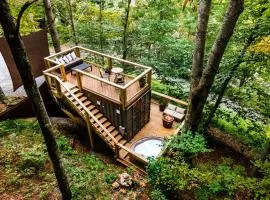 Elevated Getaway: Exclusive Tiny House with Hot Tub and Deck Views in Todd, NC