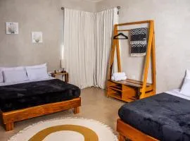 La Familia Casa and Suites