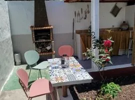 Susa and Pepe garden and house