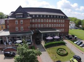 Hotel am Schlosspark，位于居斯特罗的酒店