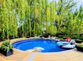 Waterfront Oasis with Pool, Hot Tub & Pet Friendly