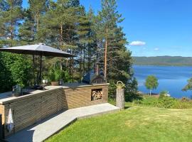 Norwegian Cabin Vibes With View In Vegårshei，位于Gjerstad的酒店