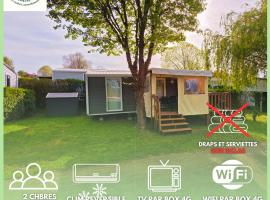 155- Joli Mobilhome 4 Pers 2 chambres Clim Tv Wifi Camping 5 étoiles，位于乌尔加特的酒店