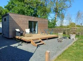 Tiny house et sauna dans un cadre verdoyant