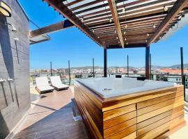Alto Padr&atilde;o vista lateral mar Jacuzzi privativa e piscina no condom&iacute;nio，位于卡波布里奥的酒店