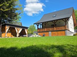Domek letniskowy Leśne Zacisze- jacuzzi, balia ogrodowa, grill i altana，位于Słopnice的酒店