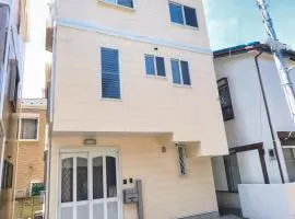A whole-house rental in Central Ichikawa City with parking-Ideally located within walking distance of 3stations on 3 railway lines connecting to Tokyo Skytree-18min, Asakusa-20min, Disney-22min, & Narita and Haneda airport-Sakura Private Vacation House
