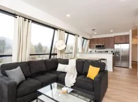 Modern condo with town and mountain views