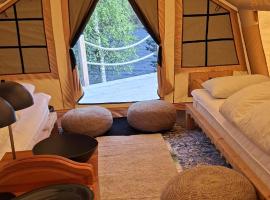 Glamping tält/tent - Glampingzelt -Lodge - Sjöutsikt，位于Blattnicksele的酒店