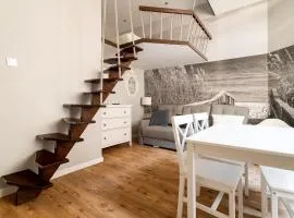 Pod Mewą - komfortowy apartament przy deptaku, 2 sypialnie, blisko plaży by Grand Apartments