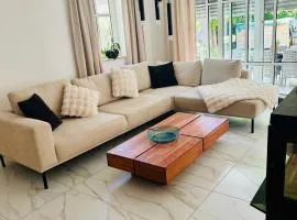 Modernes Premium Apartment mit Gartenidylle