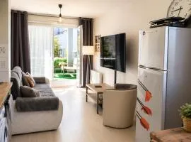 T2 L Isle d'Abeau confortable avec terrasse et garage privé