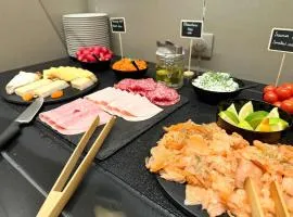 布列塔尼雷恩中心广场美居酒店