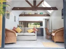 Contemporary converted barn off the village green