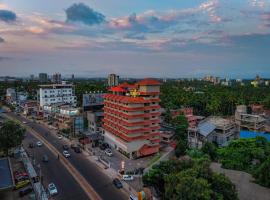 Alora Grand Hotel Calicut,位于科泽科德的酒店