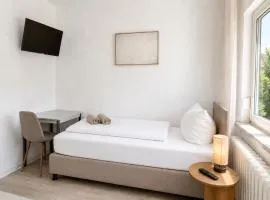 Pension Rent2Stay mit Einzel- oder Doppelzimmer, privatem Bad, Smart-TV, Schnelles WLAN, Parkplatz, Autobahnanschluß