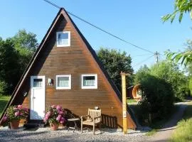 Eichhörnchen-In der Natur Zuhause-Ferienhaus mit Fass Sauna im Garten und moderner Klimaanlage
