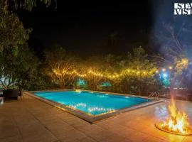 Hindavi Green Escape by VEO - Part of StayVista with Bonfire, BBQ & Pool
